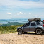suv with tent on rooftop